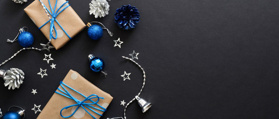 Christmas blue decoration and gift boxes on black background