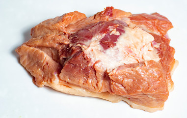 large piece of bacon isolated on white background