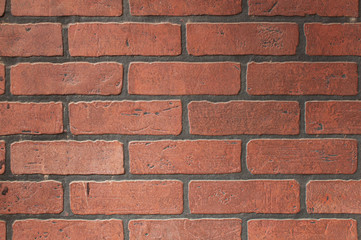Modern neat brick red wall.