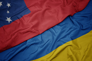 waving colorful flag of ukraine and national flag of Samoa .