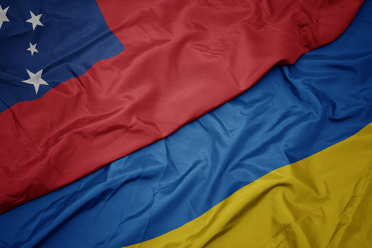 waving colorful flag of ukraine and national flag of Samoa .