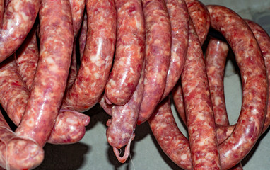 cooking homemade white sausage from pork and veal and poultry