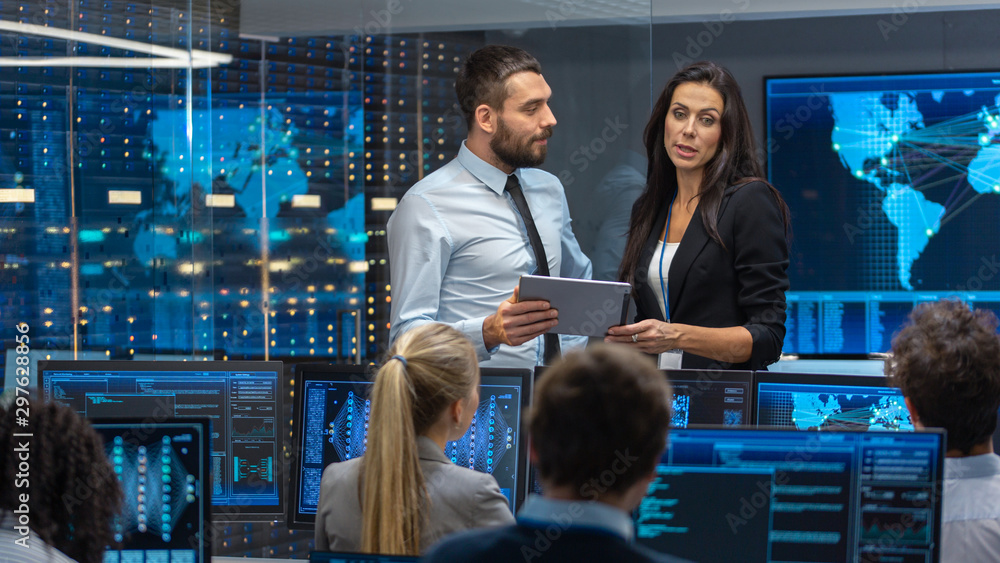 Poster Head of the Department and Project Manager Discuss Work Process Using Data on Tablet Computer. Multi-Ethnic Team Builds Neural Network with Integrated Machine Learning.