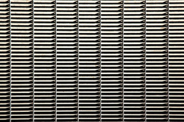 Detail of a metal grate for water runoff. Useful for textures and patterns.
