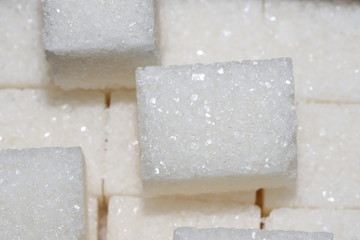 white  sugar cubes close up