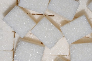 white  sugar cubes close up