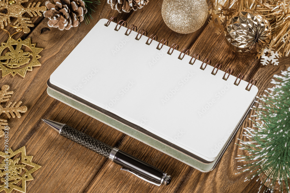 Aufkleber blank notebook on wood background with christmas ornaments decorations. mockup christmas background 