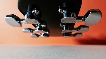 guitar headstock with tuning pegs . color background
