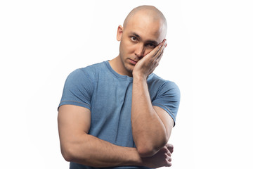Photo of shaved serious man on white background