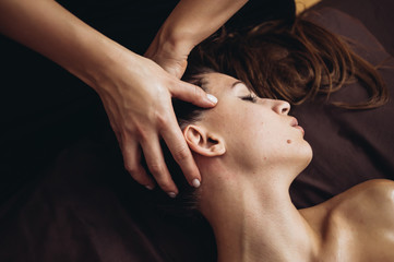Sensual massage with oil in a massage salon