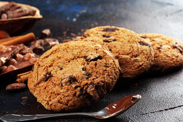 Chocolate cookies on wooden table. Chocolate chip cookies shot on table