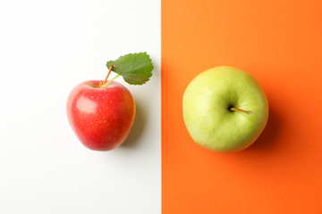 Apples on two tone background, top view
