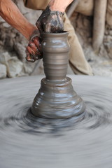 Making clay pots on a potter's wheel. Kathmandu, Nepal.