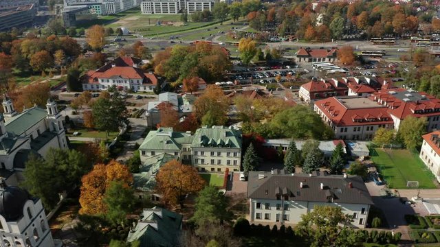 Drone shot at cottage ryan Vilanow Warsaw. Aerial view on the roofs of ancient buildings in a suburb of Warsaw. Poland. Drone Shot 4K. 