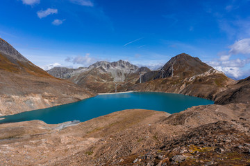 One of the many high altitude lakes in the Alps, on the border between Italy and Switzerland, near the town of Riale, Italy - October 2019.
