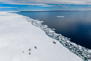 Tourists visit the floe edge near Sirmilik National Park in Nunavut, Canada