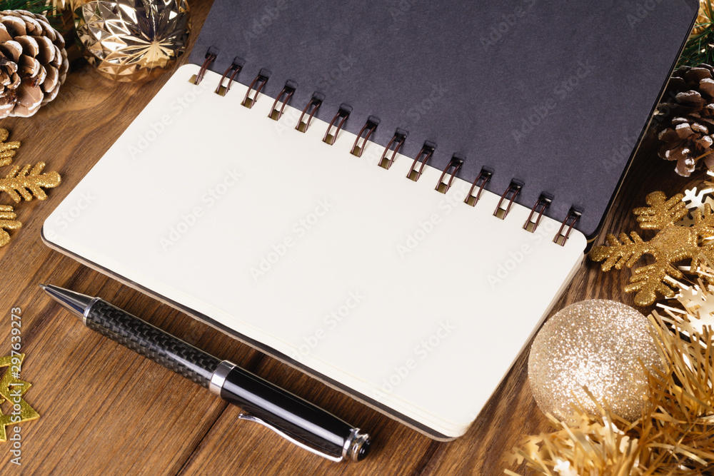 Aufkleber blank notebook on wood background with christmas ornaments decorations. mockup christmas background 