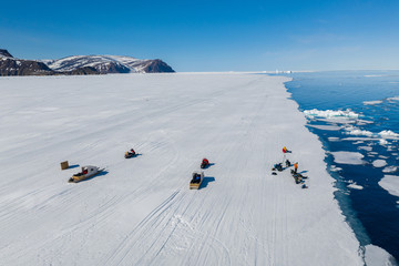 Tourists visit the flo edge near Sirmilik National Park in Nunavut, Canada