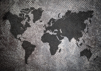 conceptual image of rock with flat world map