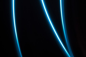 blue  light lines on a black background