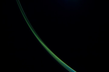 green  light lines on a black background