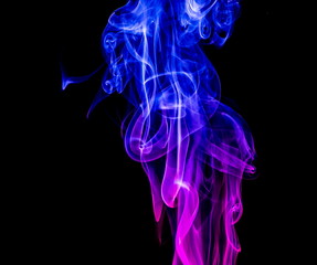Colored smoke on black background