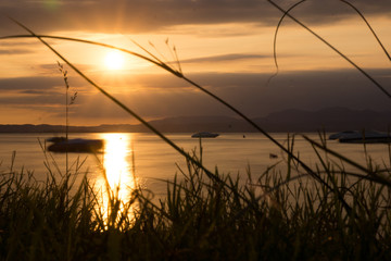 Sonnenuntergang mit Langzeitbelichtung am Gardasee