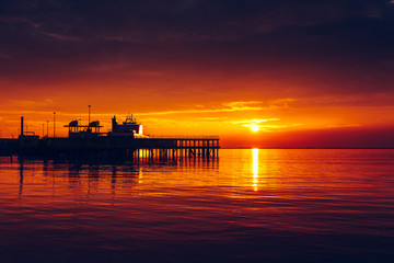 Naklejka premium Harbor at colorful sunset.