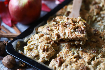Homemade fitness cookies on a baking sheet. Healthy diet cookies. Homemade oatmeal cookies with cinnamon and apple.