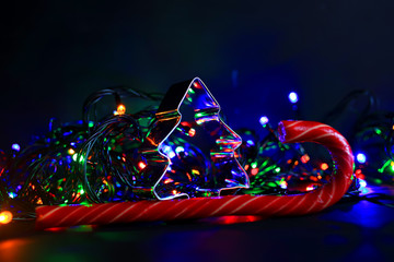 Colorful background with flickering light bulbs. Holiday concept. New Year's and Christmas