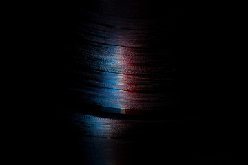 vinyl records in a dark surroundings