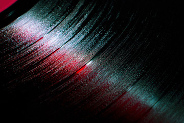 vinyl records in a dark surroundings