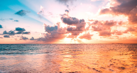 Fototapeta na wymiar ocean sunset sky background with colorful cloud -
