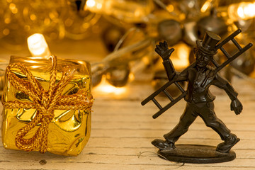 Chimney sweep with golden gift