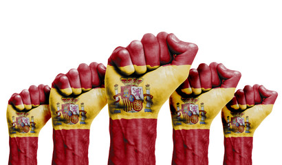 A raised fist of a protesters painted with the Spain flag