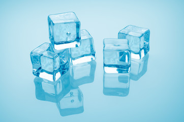 artificial ice cubes on blue background, closeup