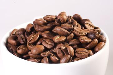 many freshly roasted coffee beans