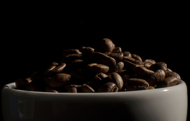 many freshly roasted coffee beans