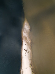 Difference color river between Nemunas (on the left) and Neris (on the right) rivers at Kaunas, Lithuania.