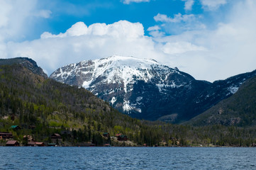 Fototapeta na wymiar Snowy mountain by the lake