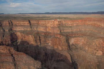 Aerial of the Grand Canyon West Rim with the famous The Skywalk Bridge at Eagle Point in the Hualapai Nation.