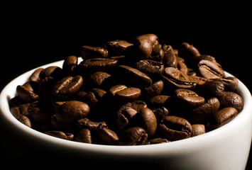 many freshly roasted coffee beans