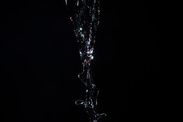 Splashes of water on a black background
