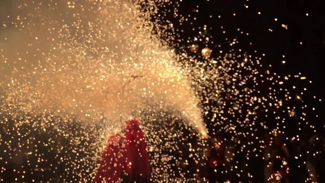 Barcelona, Spain - July 15 2019 : Fire Demons in the street for the fire run, correfoc during la street festival. 		