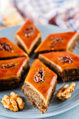 walnut baklava with glasses of tea