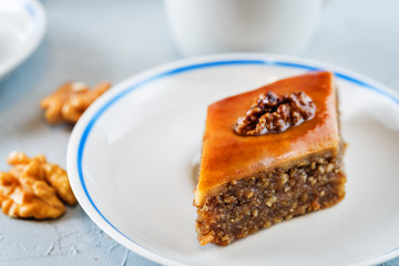 walnut baklava with glasses of tea