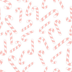 Candy canes seamless pattern on white. Christmas fabric and textile design.