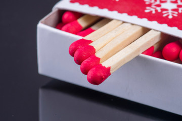 Matches in box with red head
