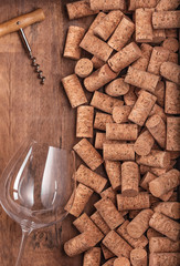 wine opener bottle on corks and wood background Poster concept design photo shooting