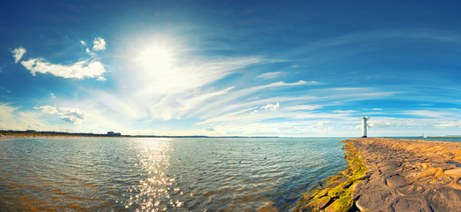 Panoramic image of a seaside by lighthouse in Swinoujscie, Poland © tilialucida
